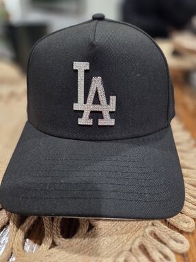 Black LA Logo Baseball Cap with Rhinestone Accent.